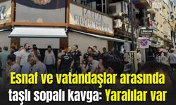 Esnaf ve vatandaşlar arasında taşlı sopalı kavga: Yaralılar var