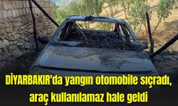 Diyarbakır'da yangın otomobile sıçradı, araç kullanılamaz hale geldi