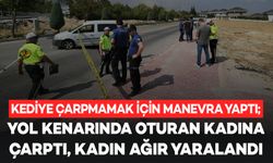 Kediye çarpmamak için manevra yaparken yol kenarında oturan kadına çarptı