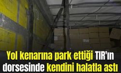 Yol kenarına park ettiği TIR'ın dorsesinde kendini halatla astı