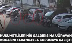 Husumetlilerinin saldırısına uğrayan kocasını tabancayla korumaya çalıştı