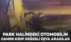 Park halindeki otomobilin camını kırıp değerli eşya aradılar