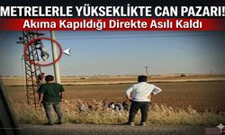 Metrelerce Yükseklikte Can Pazarı! Akıma Kapıldığı Direkte Asılı Kaldı