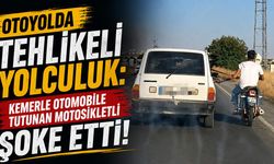 Otoyolda Tehlikeli Yolculuk: Kemerle Otomobile Tutunan Motosikletli Şoke Etti