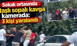 Sokak ortasında taşlı sopalı kavga kamerada: 3 kişi yaralandı