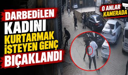 Darbedilen kadını kurtarmak isteyen genç bıçaklandı: O anlar kamerada