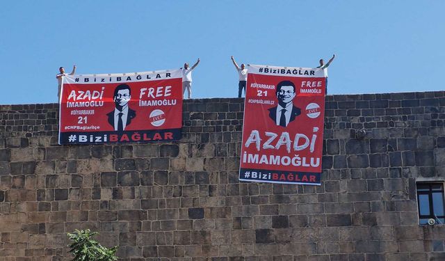 Diyarbakır'da surlara asılan İmamoğlu pankartları polis tarafından kaldırıldı